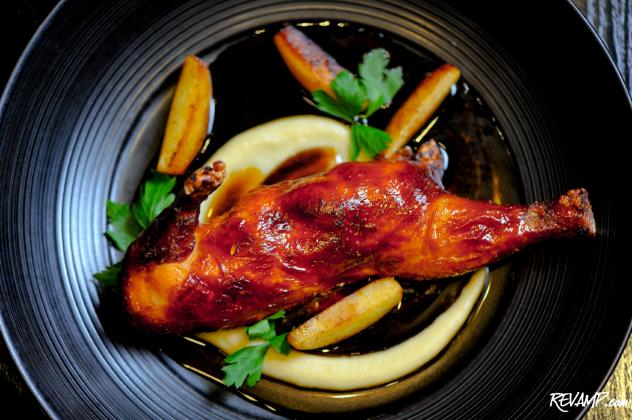 ZENTAN's Garlic Chicken with parsnip puree, caramelized apples, and sweet and sour sauce.
